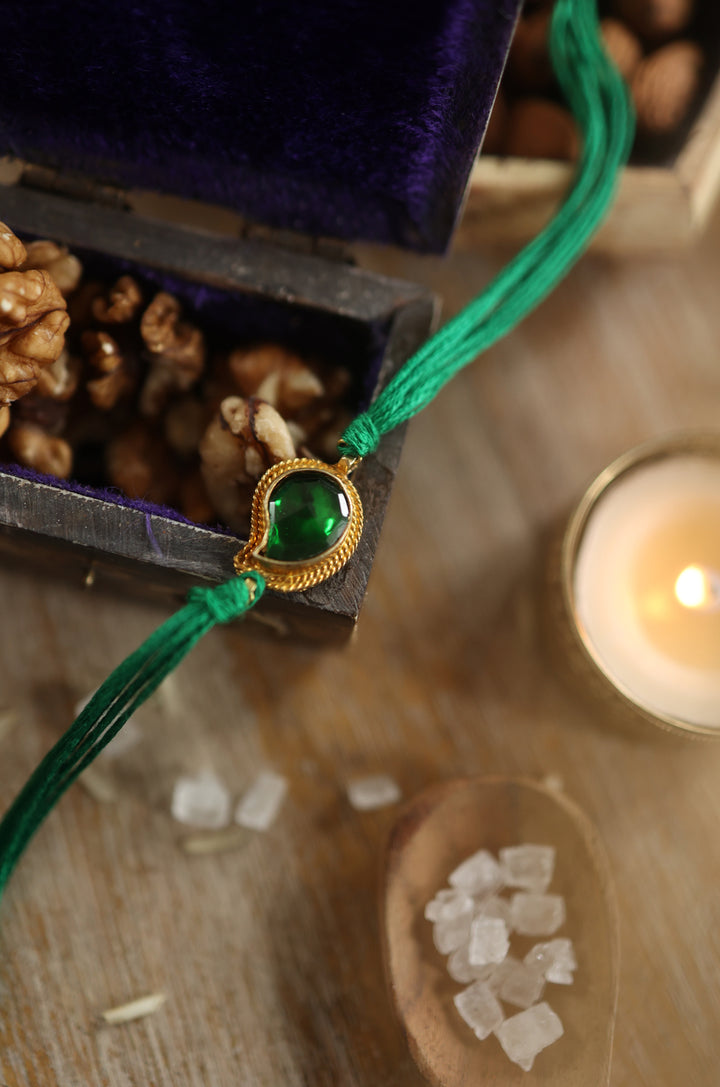Prasit Gold Plated Emerald Rakhi