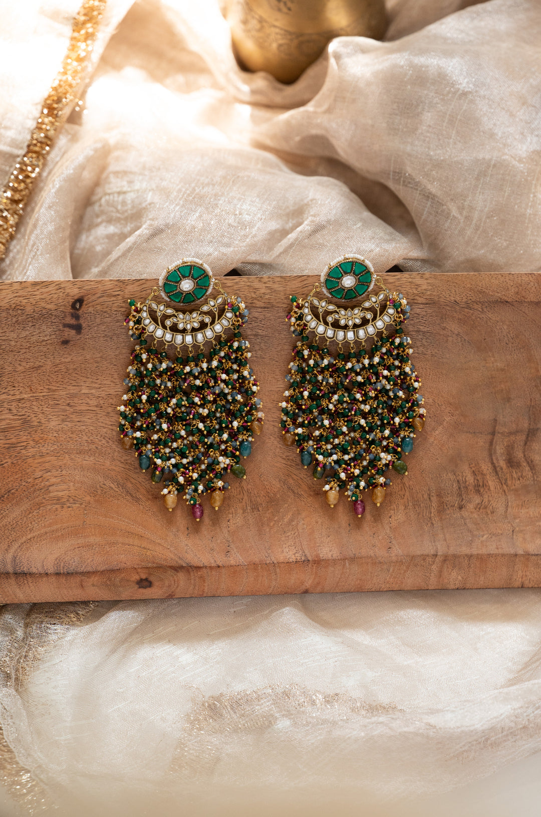 Uravshi Green Kundan Earrings