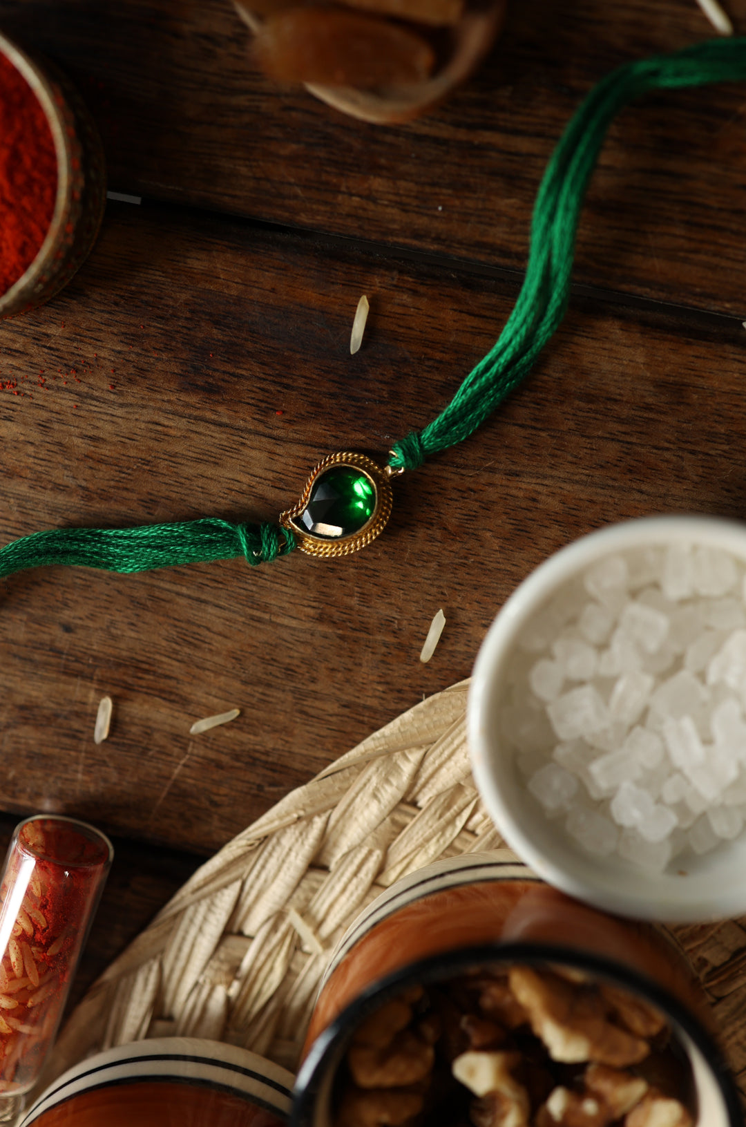 Prasit Gold Plated Emerald Rakhi