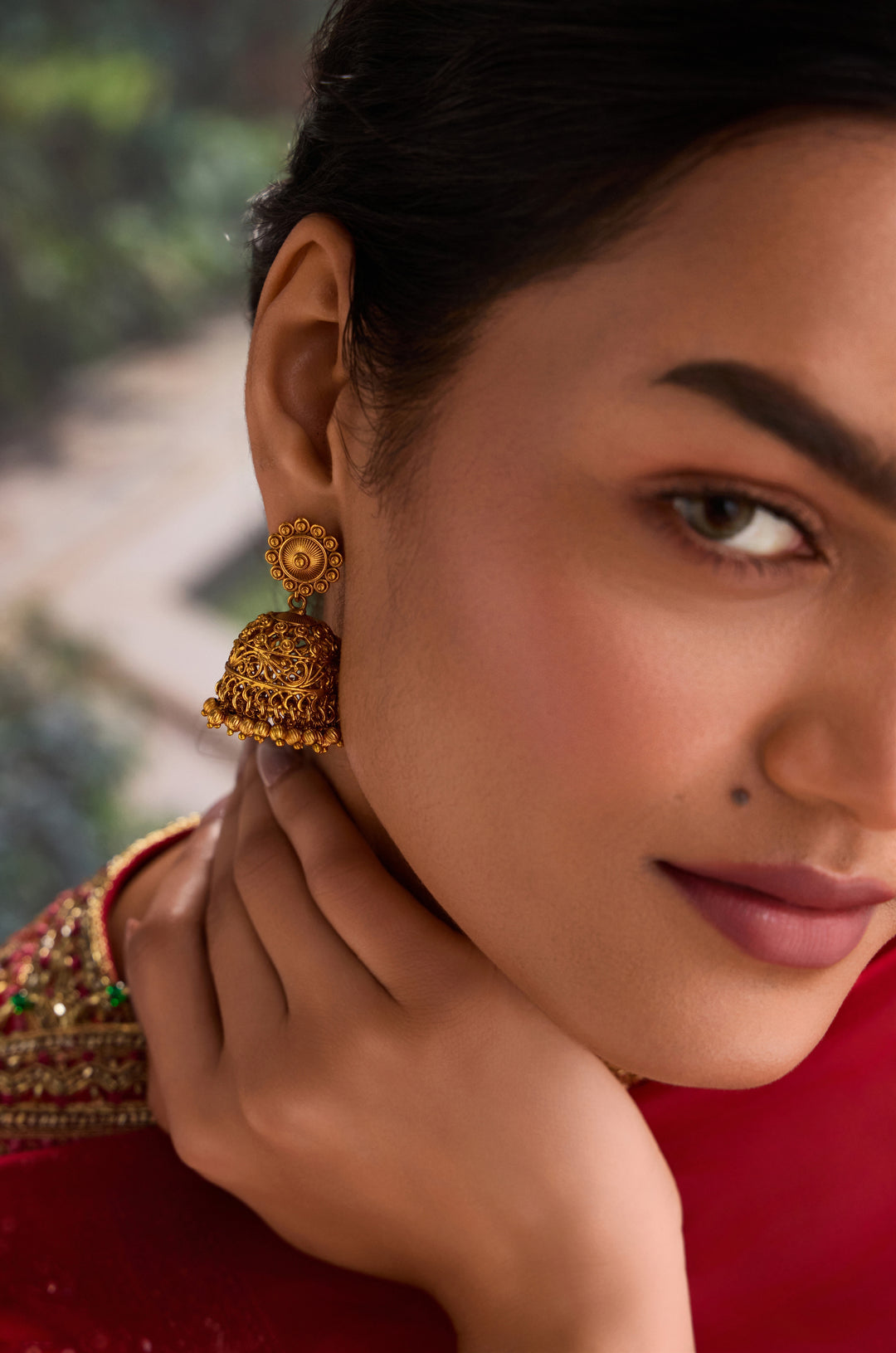 Onni Temple Work Jhumka Earrings