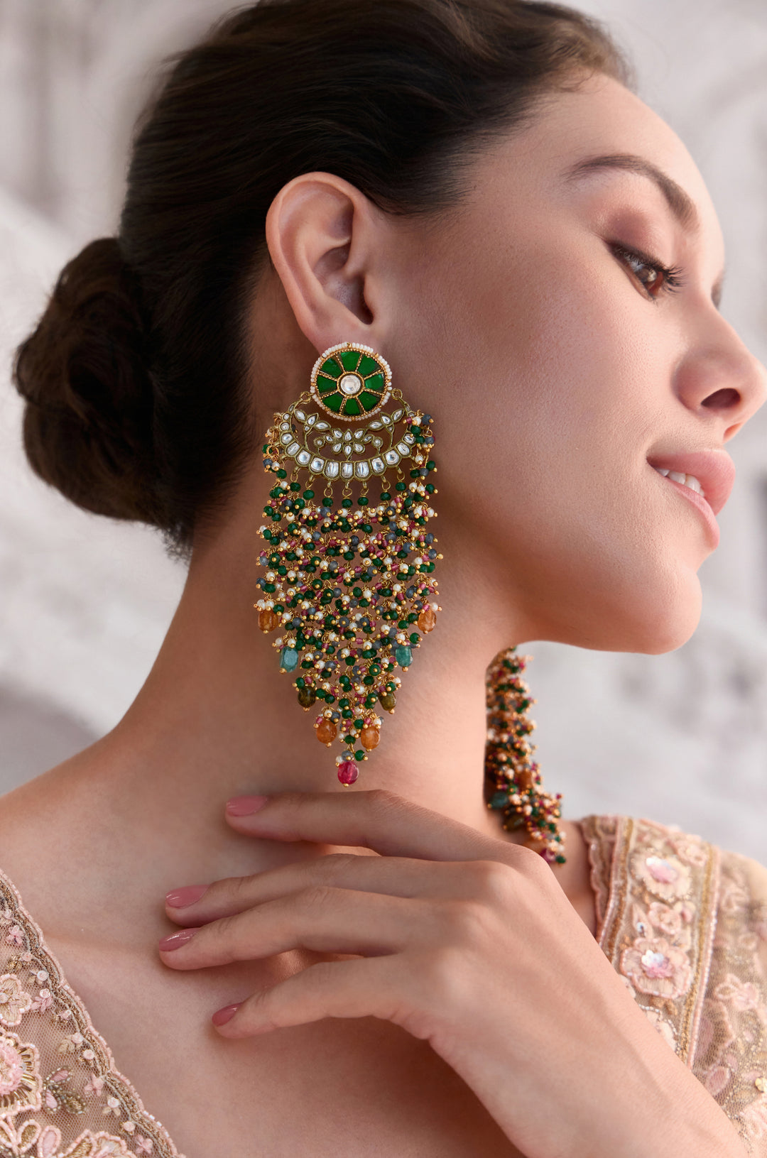 Uravshi Green Kundan Earrings