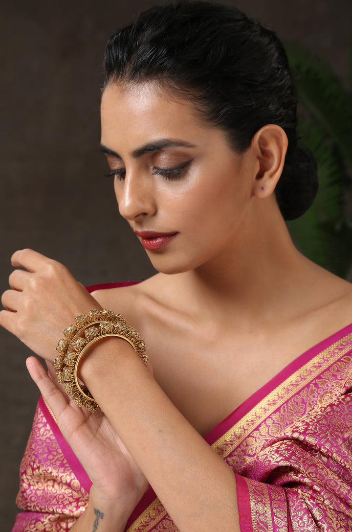 Tavisha Temple Work Embossed Bangles - Set of 2