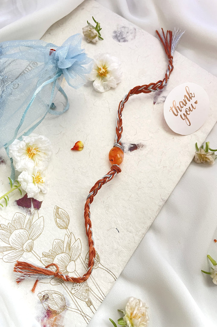 Sanjay Orange Braided Rakhi