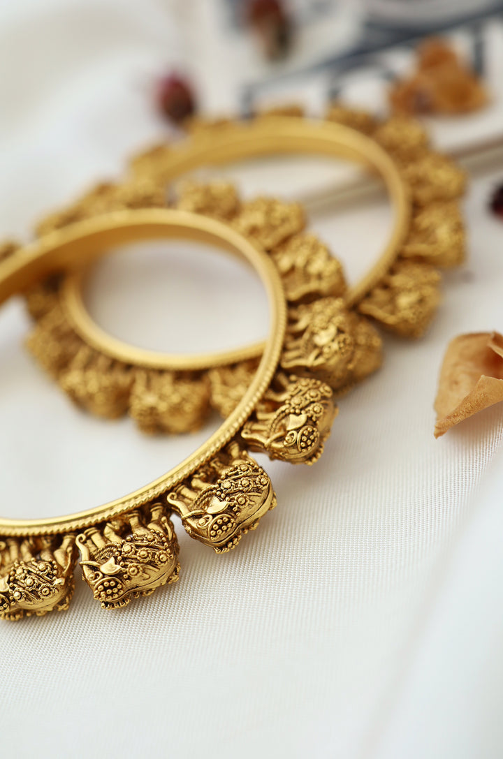 Tavisha Temple Work Embossed Bangles - Set of 2